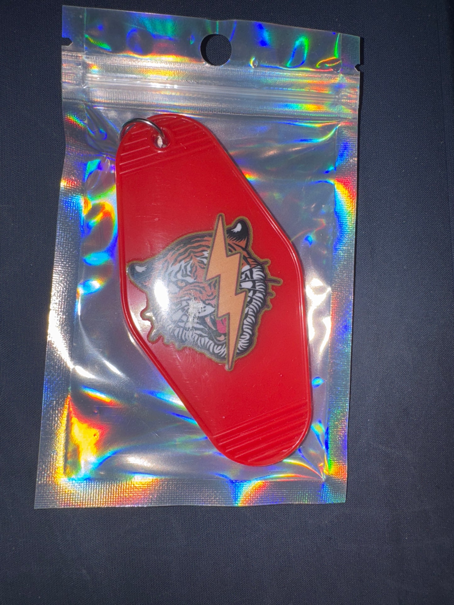 MOTEL KEYCHAIN: Tiger Lighting on Red